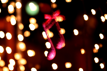 cristmas music note decoration in front of a bokeh lightsの写真素材