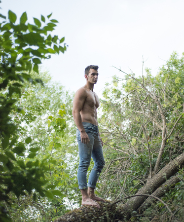 Handsome fit man posing outdoorsの写真素材