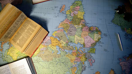 Map of the world and old books.travel conceptの写真素材