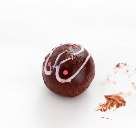 homemade chocolate bonbons closeup on white backgroundの写真素材