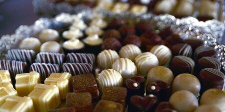 image of an assorted sweets on party tableの写真素材