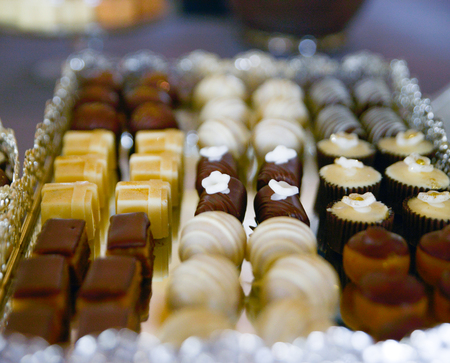 image of an assorted sweets on party tableの写真素材