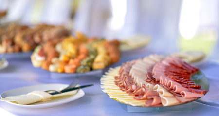 image of a variety catering food on a table, food decoration, party concept, delicatessenの写真素材