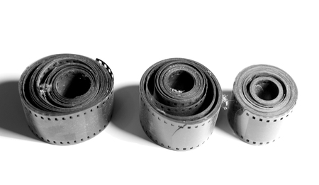 35mm film strip isolated on white backgroundの写真素材