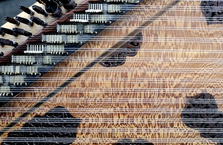 Deail from kanun, a Turkish classical music instrument played on lapsの写真素材