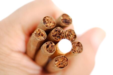 hand holding Cigarillos and cigarette , image of aの写真素材