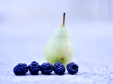 fresh harvested ripe blackberries and pear image of aの写真素材