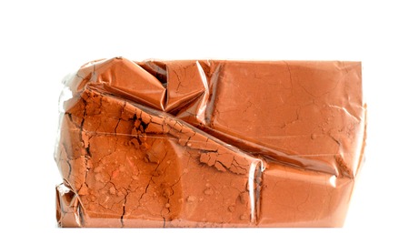 cocoa powder in plastic packaging with date of production isolated on white background,image of aの写真素材
