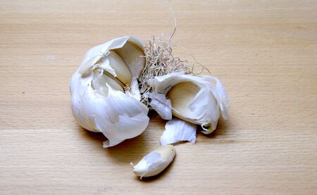 image of a Garlic on wood backgroundの写真素材