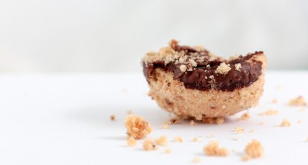 Pieces of a Chocolate Cookie on white backgroundの写真素材