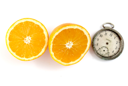 sliced orange halves on white backround,image of aの写真素材