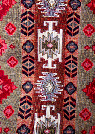 colorful geometric shapes of a carpet, top view