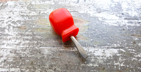 screwdriver on an old painted wod background, imageの写真素材