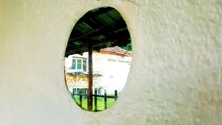 reflections in a mirror built into the wallの写真素材