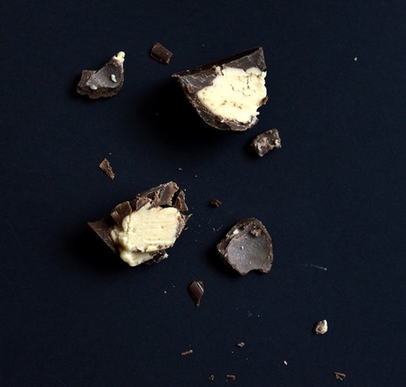 cut bonbon praline on a black background,imageの写真素材