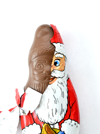 unwrapped chocolate santa clausの写真素材