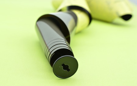 old vintage camera roll film on a green backgroundの写真素材