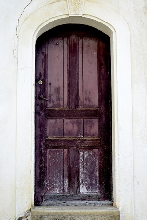 wooden door of old house in village of ljubojno, region prespa, macedonia imageの写真素材