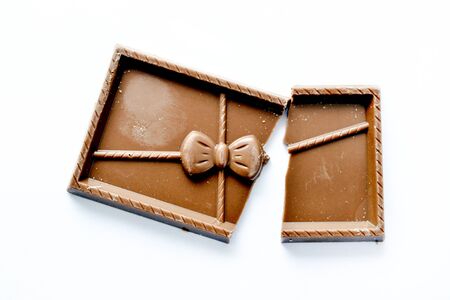 sweet chocolate pieces on white background,の写真素材