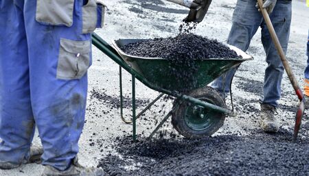 reconstruction of a street road,municipal work.の写真素材