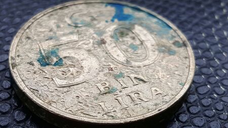 dirty and dusty coin on black background,turkey money.の写真素材