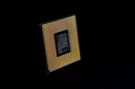 The computer the processor on a dark background,