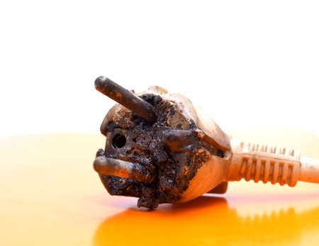 Electric plug damaged by overheating imageの写真素材