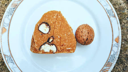 cake made by ground bisquits and chocolate covered banana cream.