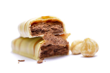 Chocolate bar with filling. Shallow dof on whiteの写真素材
