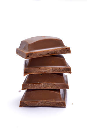 Chocolate bar with filling. Shallow dof on whiteの写真素材