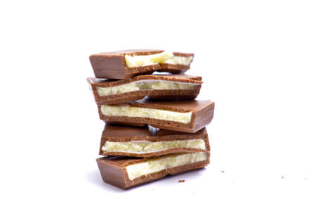 Chocolate bar with filling. Shallow dof on whiteの写真素材