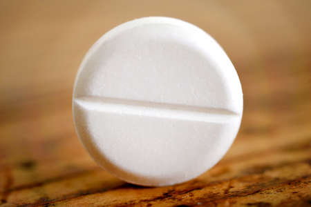 Treatment concept   The name of the virus is written with white pills imageの写真素材