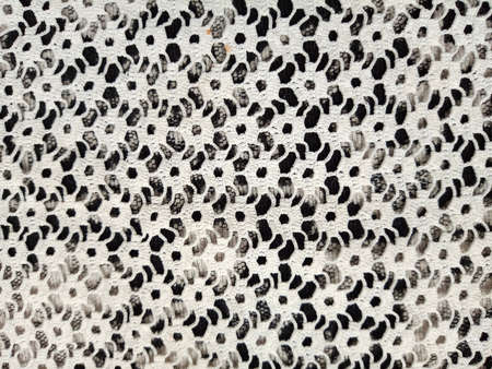 Old weathered Crochet lace close up image