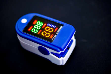 pulse and oximeter medical device on black background image