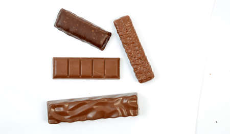 various sweet and tasty chocolate bars isolated on white,top viewの写真素材