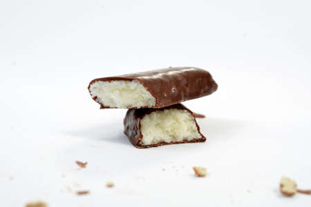 sweet and tasty chocolate coconut bar isolated on white.
