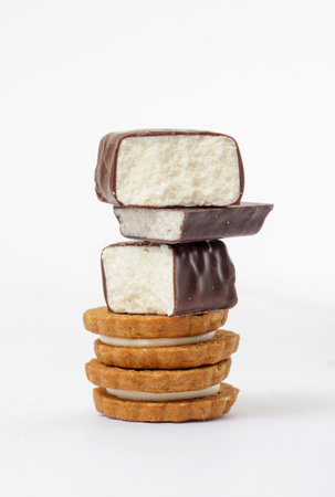 Chocolate Protein bar filled with chocolate saucevand cookies , on a white background