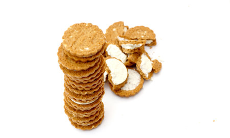 biscuit sandwich cookies, baked biscuits stuffed with milk cream in plastic packaging