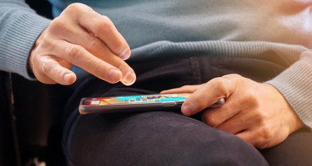 Close up of a man using mobile smart phone,の写真素材