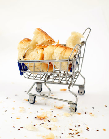 Homemade traditional fresh baked rolls with black caraway and sesame seeds.の写真素材