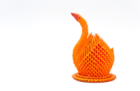 Orange duck made of plastic isolated on white background.の写真素材