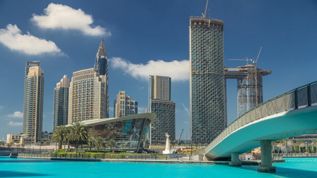 Park with fountain pool and bridge timelapse.の写真素材