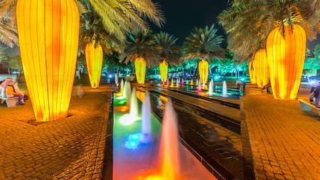 Orange carrot palm trees. Newly opened Dubai Glow Garden day to night transition timelapse is a...