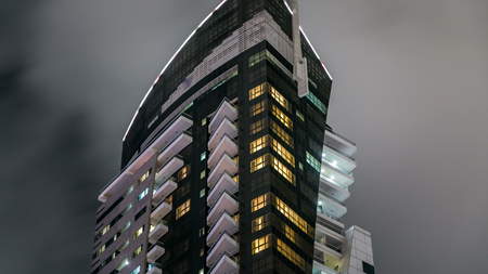 DUBAI, UAE - 03 JAN 2016: Beautiful night close up view from Promenade on Dubai Marina modern Towers...