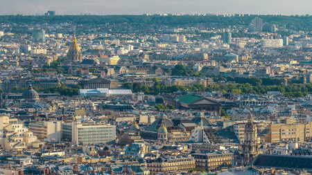 Panorama of Paris timelapse with Les Invalides, France. Top view from Sacred Heart Basilica of Montmartre (Sacre-Coeur). Sunny day with blue cloudy sky.の写真素材