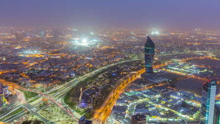 Kuwait City cityscape from top day to night transition timelapse is the capital of Kuwait. It has a population of 2.38 million in the metropolitan area. Located on the shore of the Persian Gulf.の写真素材
