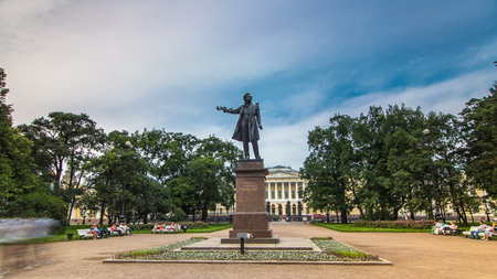 Monument to Alexander Pushkin timelapse hyperlapse on Ploshchad Iskusstv (Arts Square) in front of the Russian Museum ( Mikhailovsky Palace) in St.-Petersburg, Russiaのeditorial素材