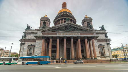 St. Isaac Cathedral timelapse hyperlapse in Saint-Petersburg, Russia. Sityscape with cloudy sky and traffic on the roadの写真素材