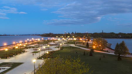 View of the city park strelka in Yaroslavl located along the Volga river embankment day to night transition timelapse hyperlapse, a popular local and touristic landmark.の写真素材