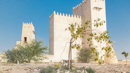 Barzan Towers timelapse, watchtowers in Umm Salal Mohammed near Doha - Qatar, the Middle East. Blue sky at sunny dayのeditorial素材